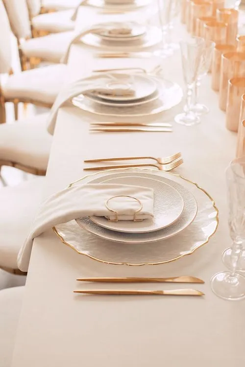 Ivory table service at long rectangular table
