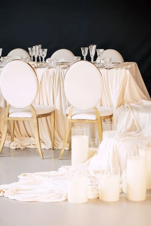 Ivory table setting at rectangular table