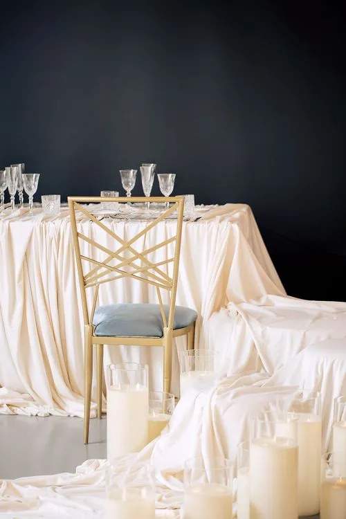 Ivory table setting at rectangular table