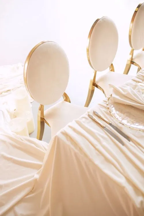 Ivory table setting at rectangular table