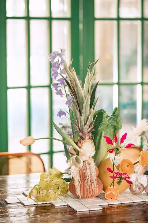 Modern Rectangular Table — Clear Chairs, Floral + Fruit