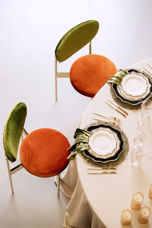 Modern Round Dining with Pumpkin Accents