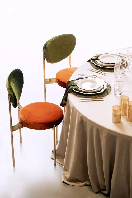 Modern Round Dining with Pumpkin Accents