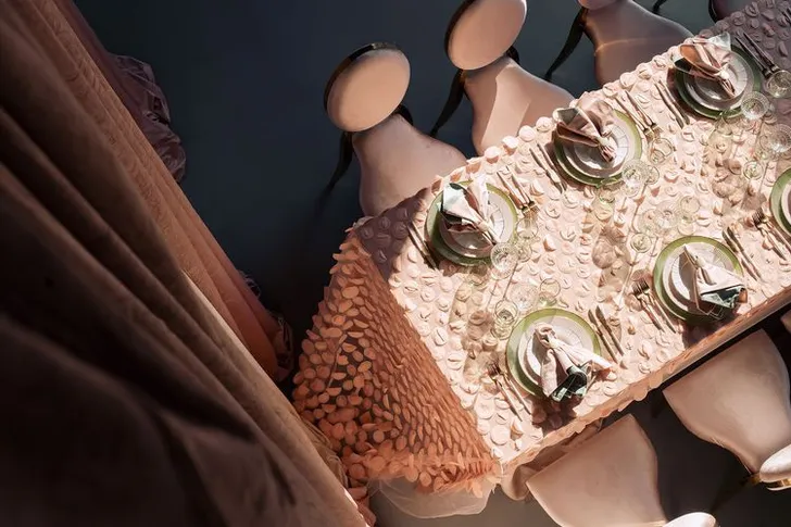 Nude table setting at rectangular table