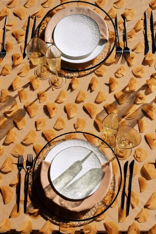 Peach table setting at rectangular table