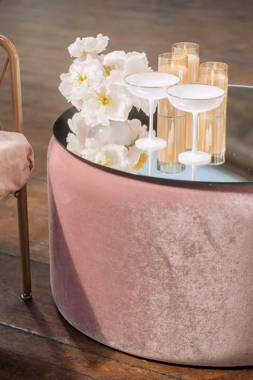 Peach-lavender table setting at caterpillar table