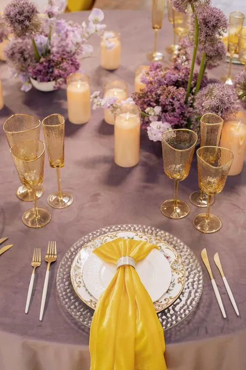 Peach-lavender table setting at caterpillar table