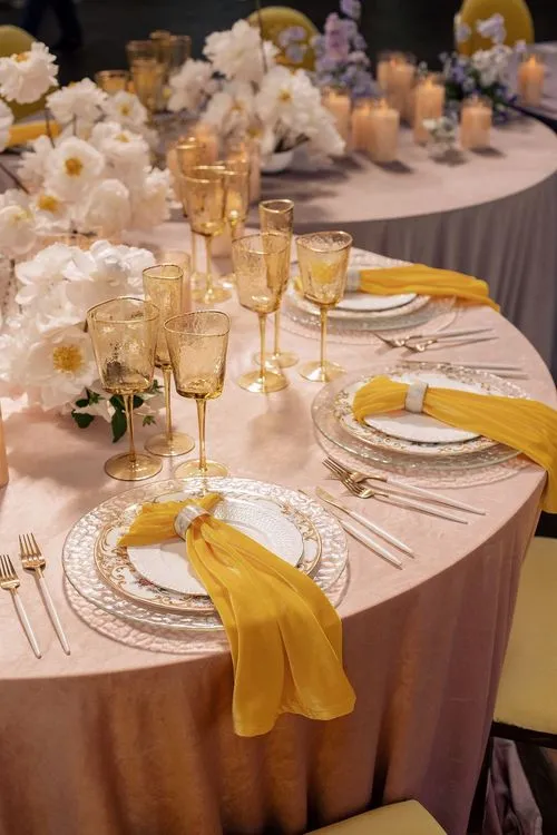 Peach-lavender table setting at caterpillar table