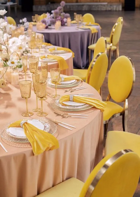 Peach-lavender table setting at caterpillar table