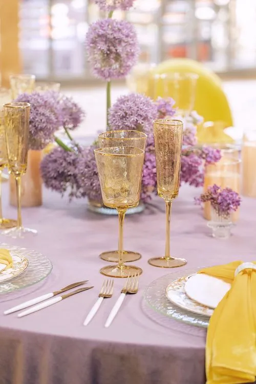 Peach-lavender table setting at caterpillar table