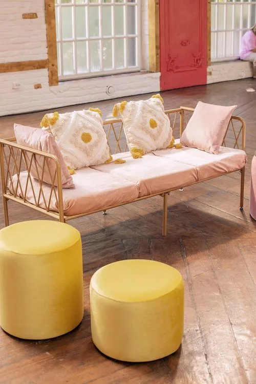 Peach-lavender table setting at caterpillar table