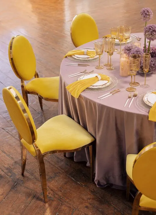 Peach-lavender table setting at caterpillar table
