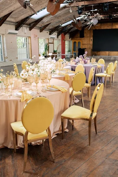 Peach-lavender table setting at caterpillar table
