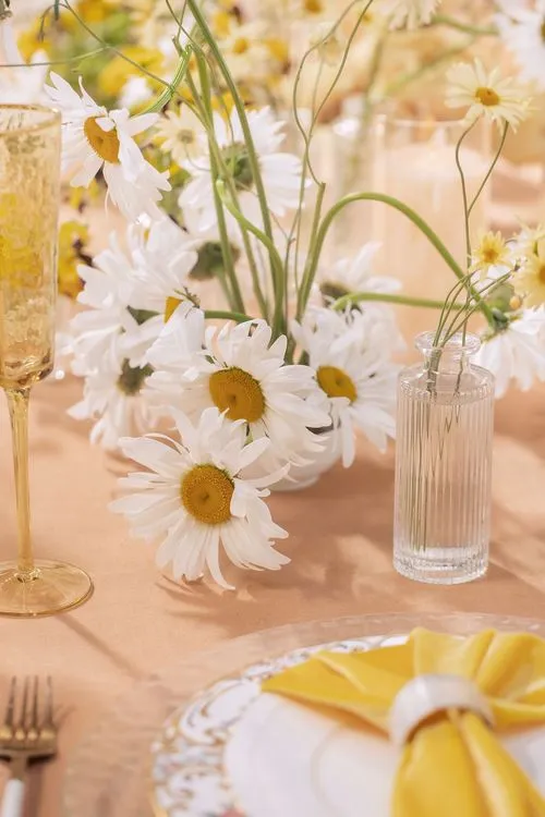 Peach-lavender table setting at caterpillar table