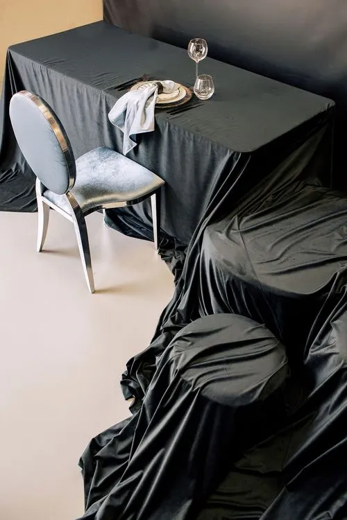 Pearl-blue table setting at rectangular table