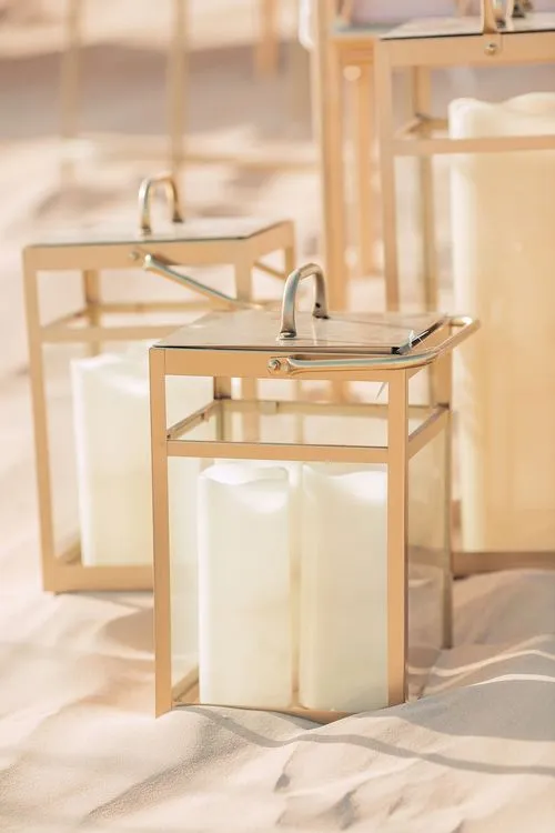 Pink desert lounge setup with ottomans