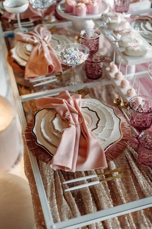Pink kids party with velvet poufs
