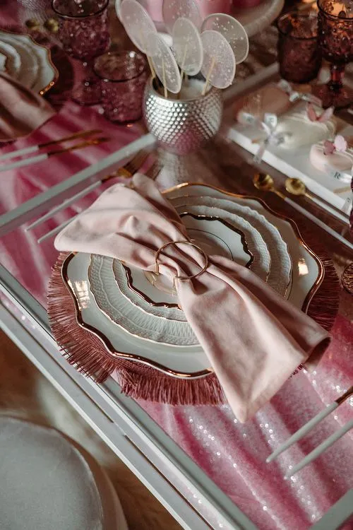 Pink kids party with velvet poufs