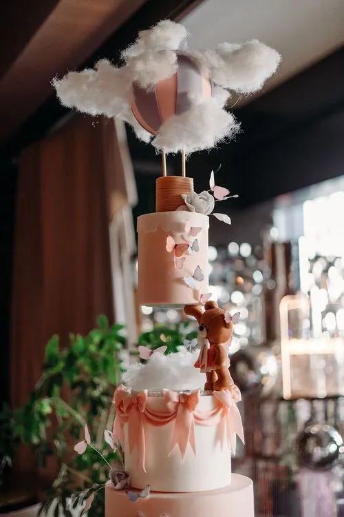 Pink kids party with velvet poufs