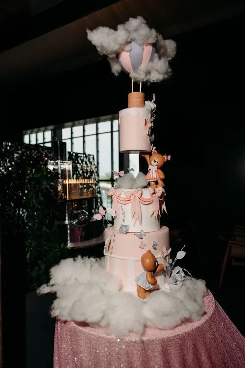 Pink kids party with velvet poufs