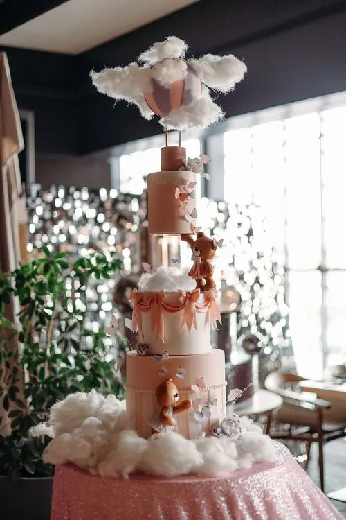 Pink kids party with velvet poufs