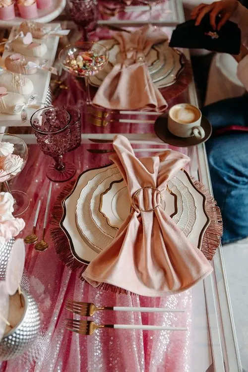 Pink kids party with velvet poufs
