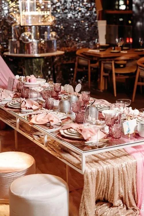 Pink kids party with velvet poufs