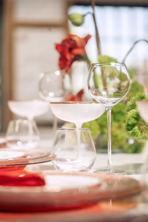 Red table setting at rectangular table