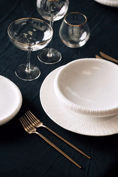 Red-black table setting at rectangular table