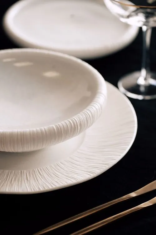 Red-black table setting at rectangular table