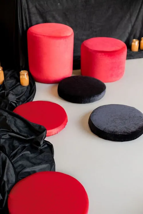 Red-black table setting at rectangular table