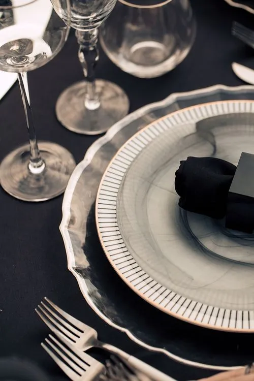 Smoky table setting at round table