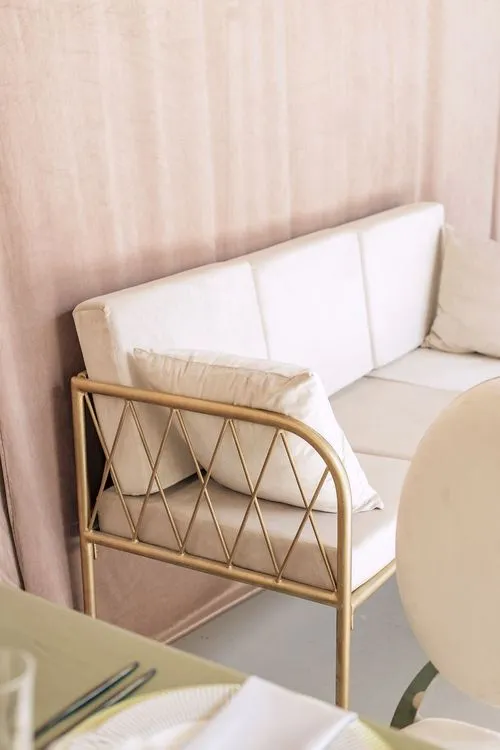 Soft green table setting at rectangular table