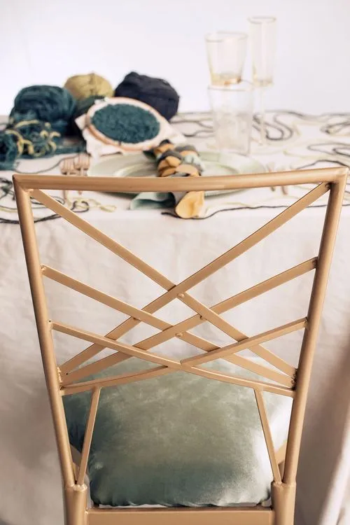 Soft green table setting with embroidery hoops