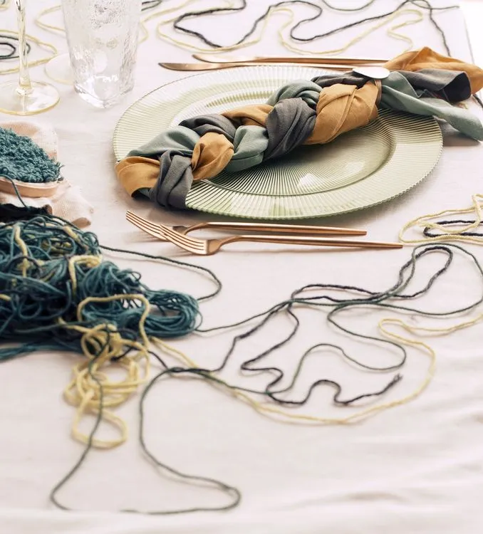 Soft green table setting with embroidery hoops
