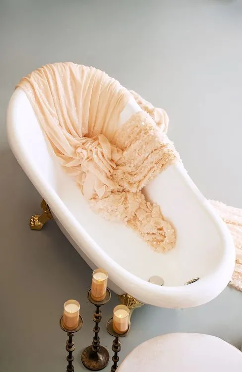 Soft pink table setting at round table