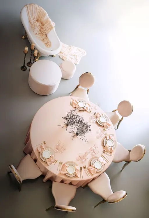 Soft pink table setting at round table