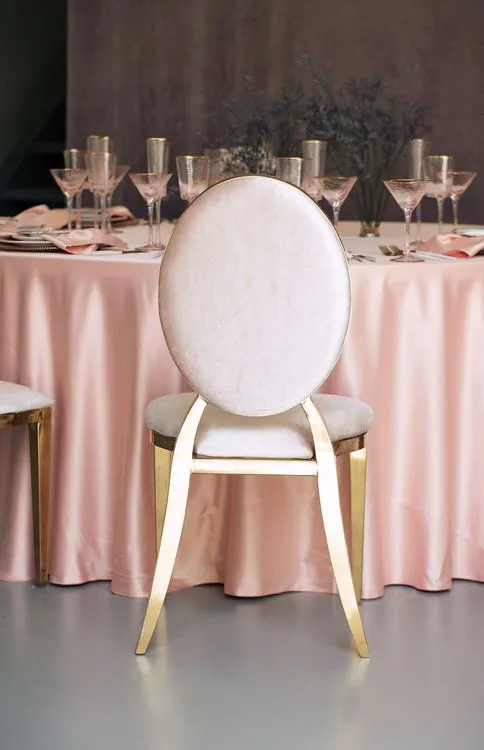 Soft pink table setting at round table