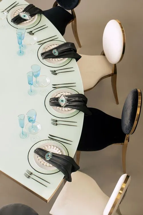 Eye-shaped table and black-and-white set