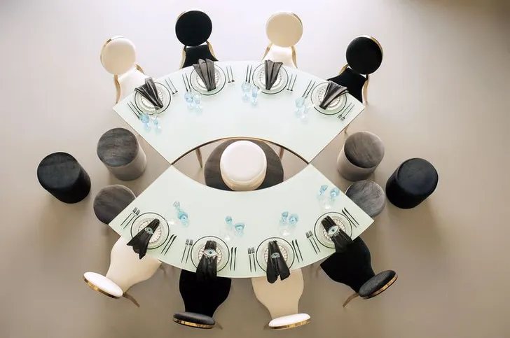Eye-shaped table and black-and-white set
