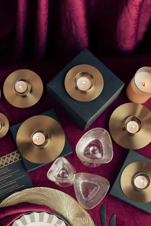 Velvet-Draped Dining — Gold Candles, Burgundy Noir