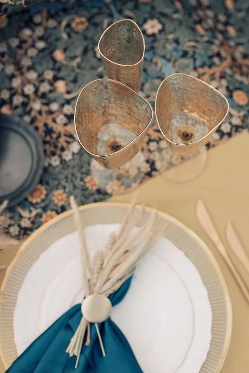 Wheat table setting with blue accent