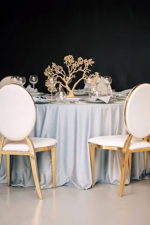 White-blue table setting at round table