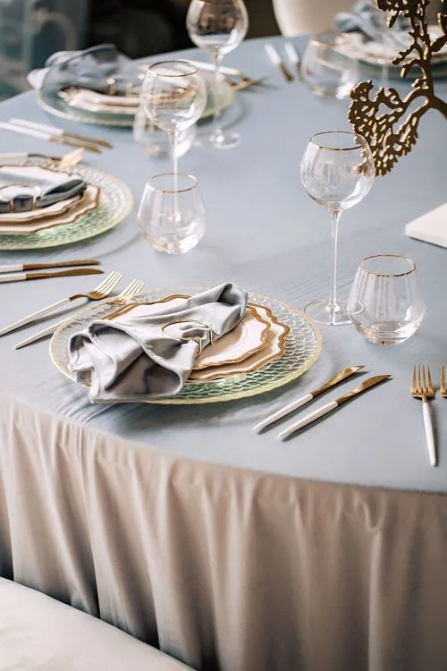 White-blue table setting at round table