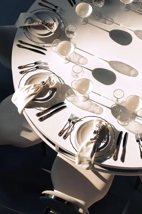 White glass round table modern setup