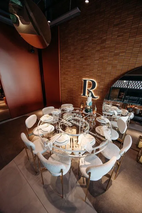 White glass table cozy chairs