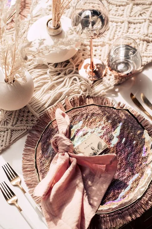 White-pink boho table setting with pearl accents