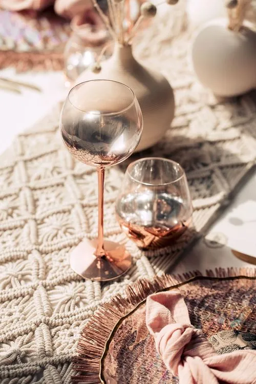 White-pink boho table setting with pearl accents