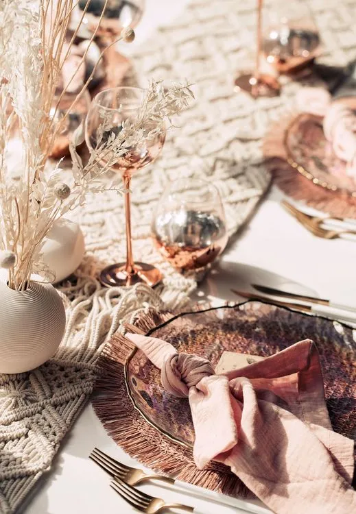 White-pink boho table setting with pearl accents