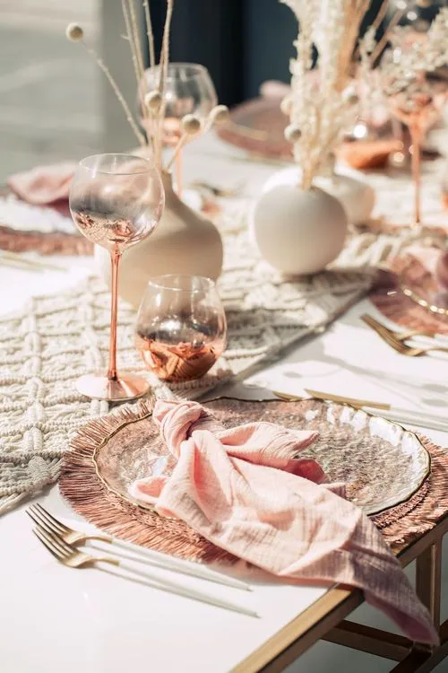 White-pink boho table setting with pearl accents